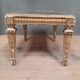 Gold coffee table in Louis XVI style