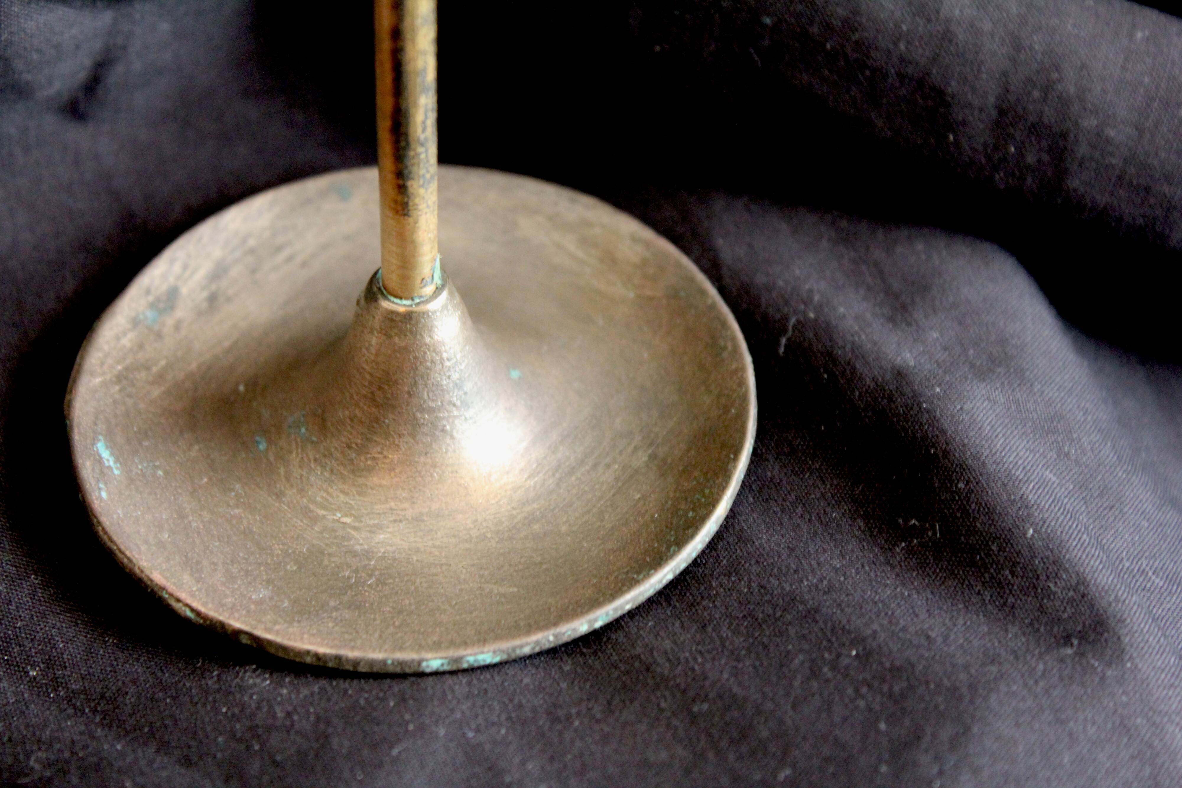 Pair of brass candle holders