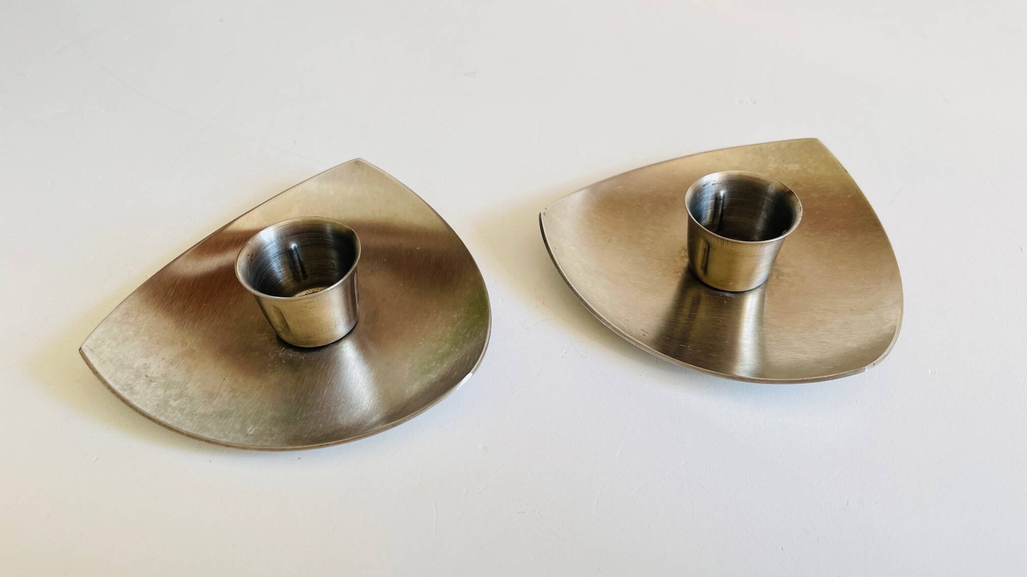 Vintage brushed metal geometric candle holders