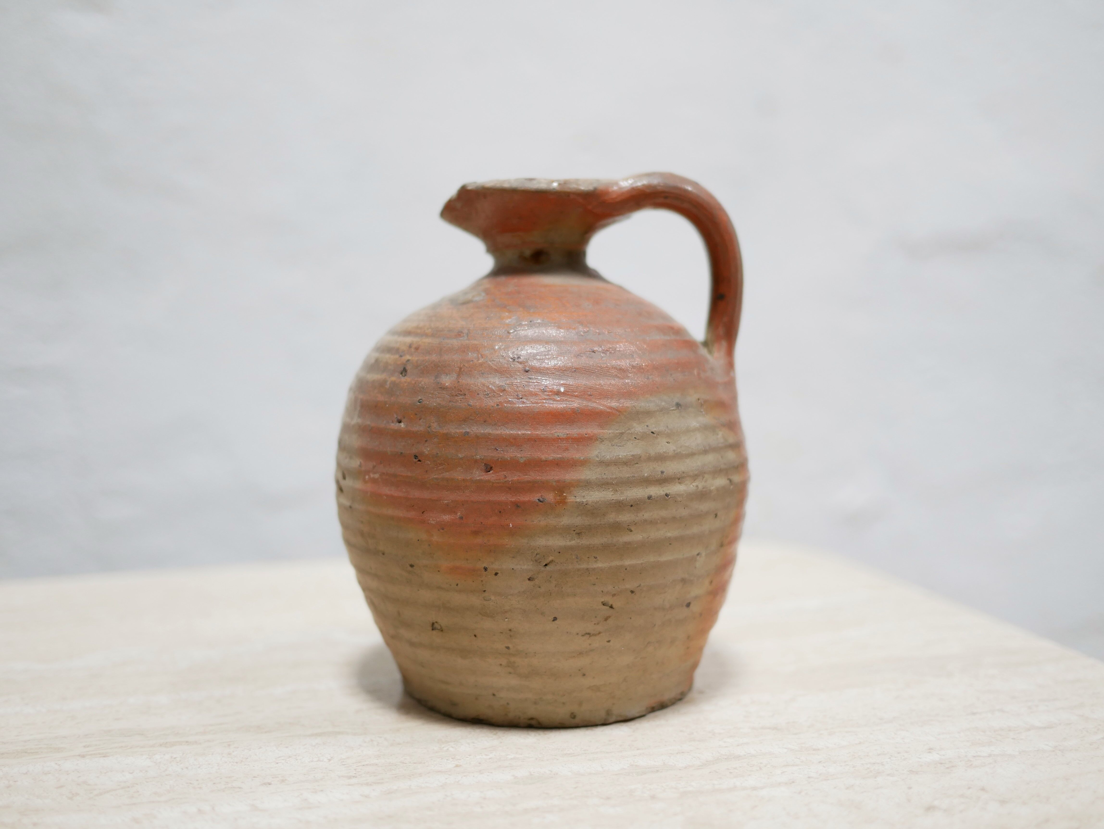 Old glazed terracotta jar