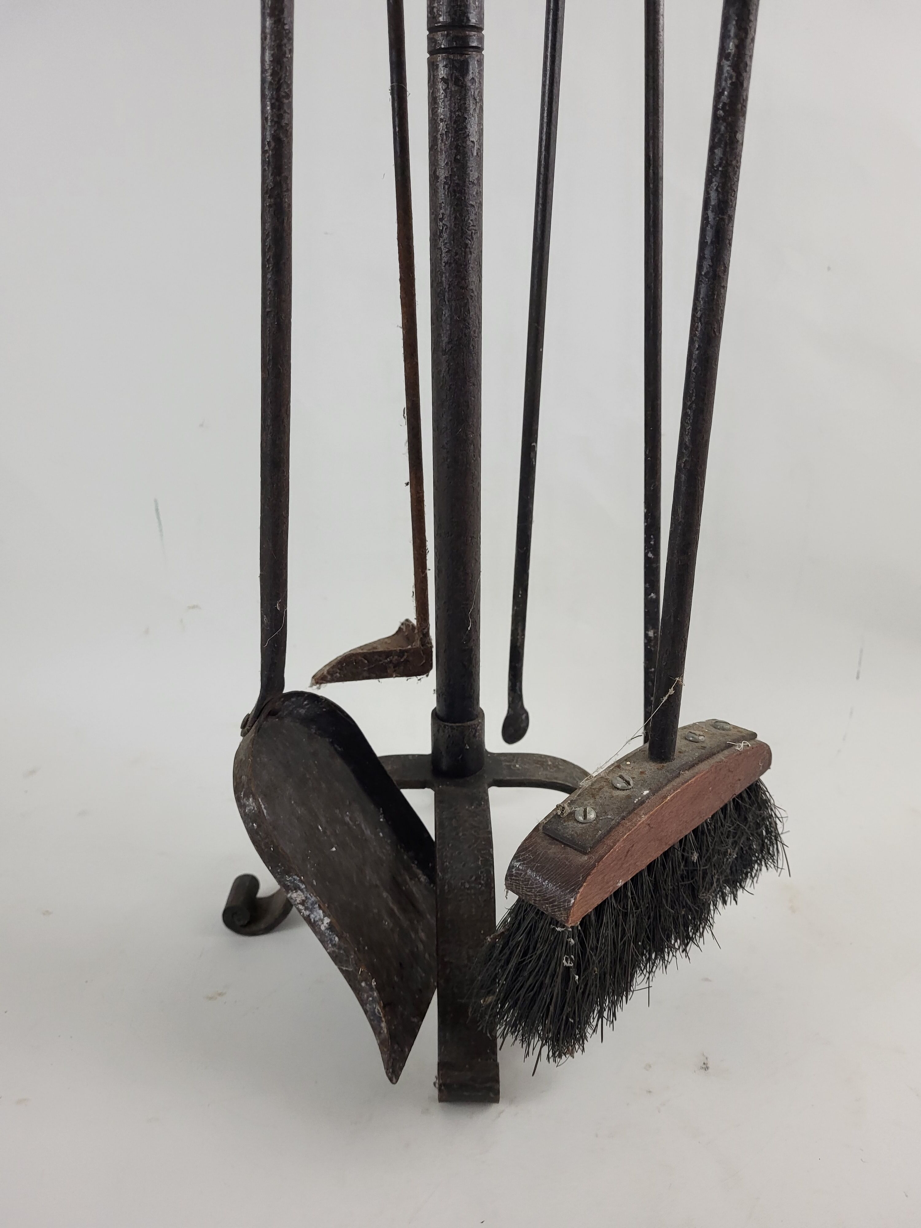 Wrought iron fireplace servant