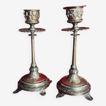 Pair of old engraved brass candlesticks