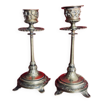 Pair of old engraved brass candlesticks