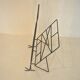 Iron magazine rack, 1930s