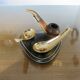 Black leather piped pipe holder with brass, Tremblay edition, Paris