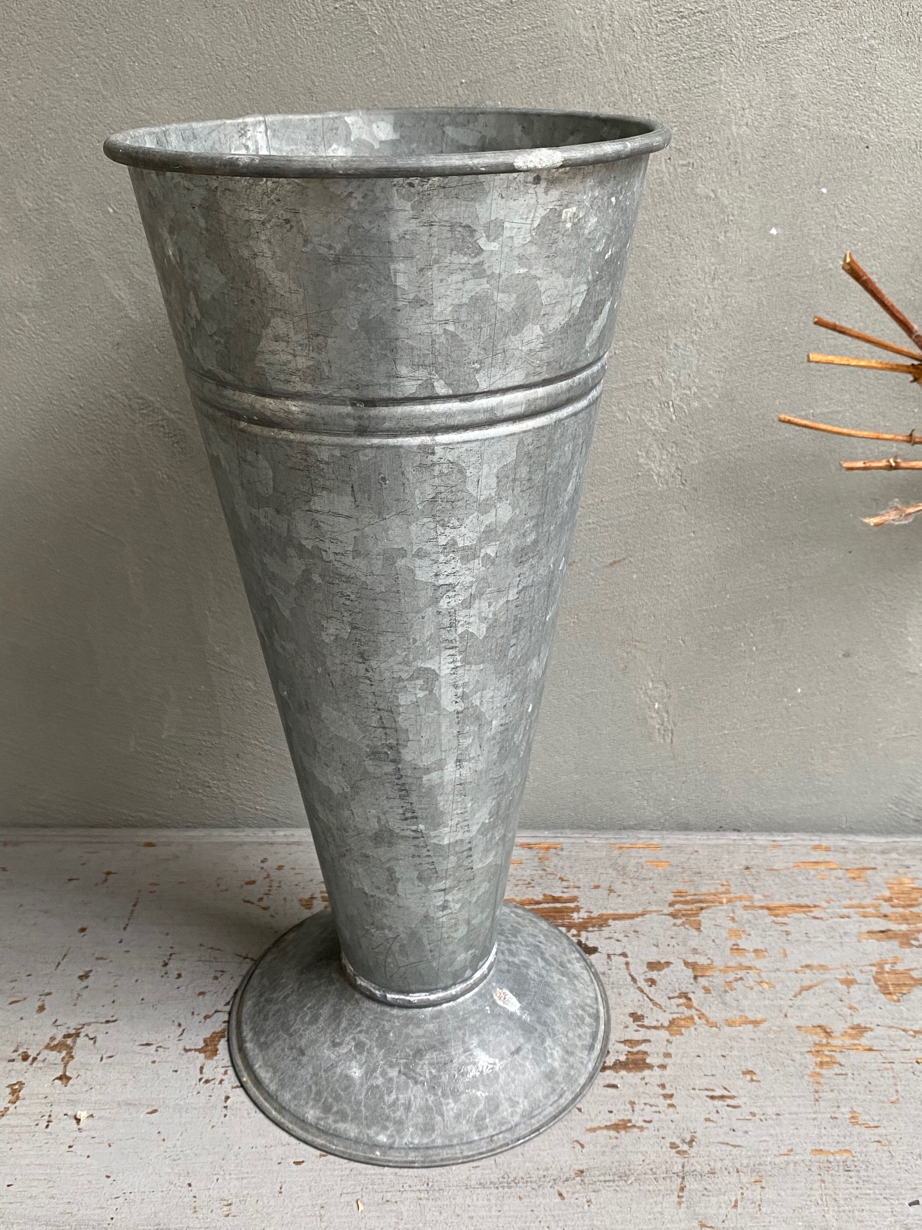 Old zinc florist's vase