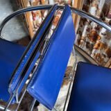 Set of 6 blue chairs with design curves
