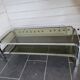 Chromed metal coffee table with smoked glass top from the 70s