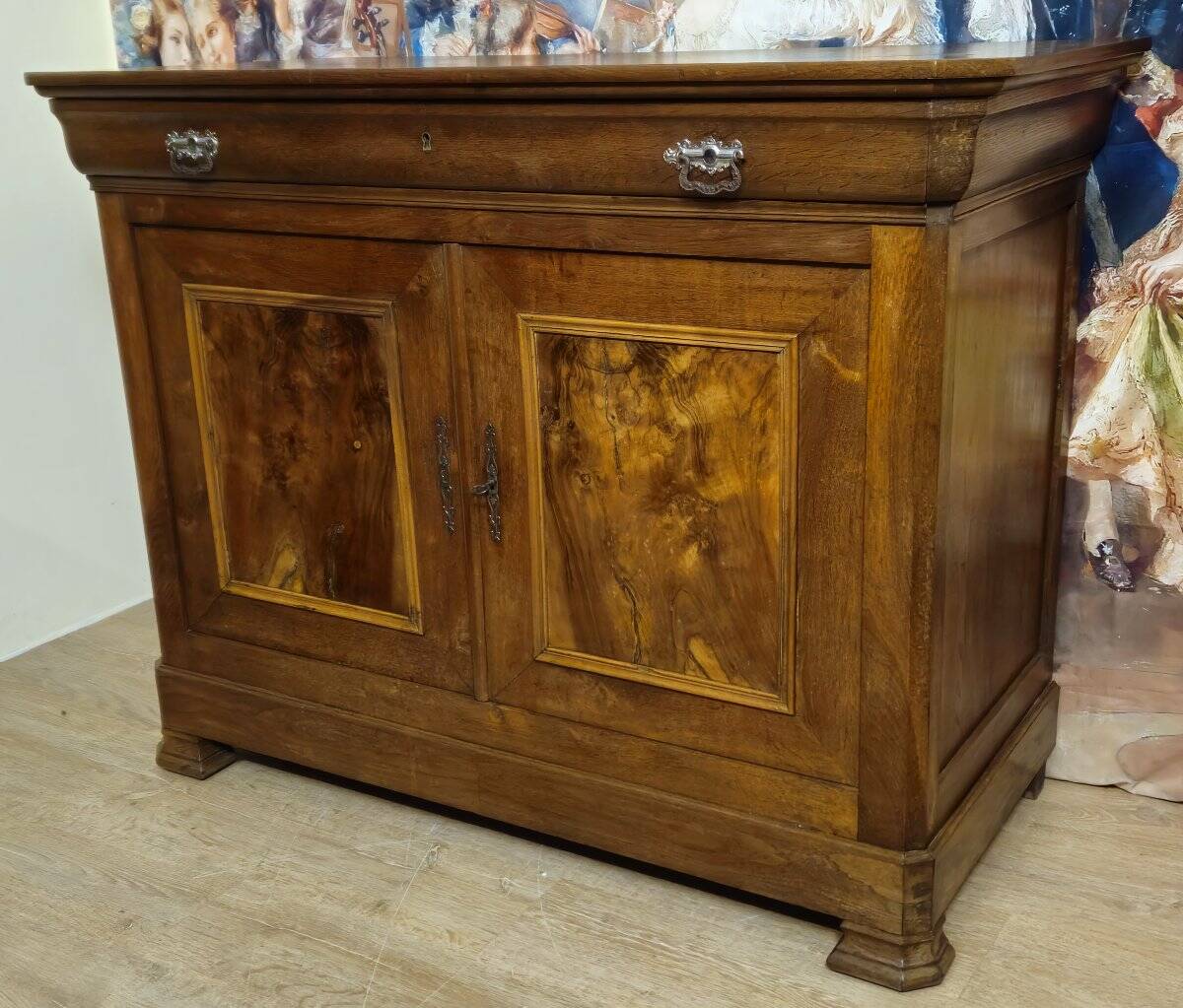 Low buffet with a curved front from the Louis Philippe period in walnut.