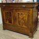 Low buffet with a curved front from the Louis Philippe period in walnut.