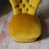 Toad in yellow velvet armchair