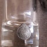 Glass liquor glass with tin sconces signed J.de Rey