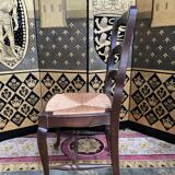 Suite of 8 rustic mulched chairs with crisscross