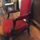 Old children's armchair with foot rests