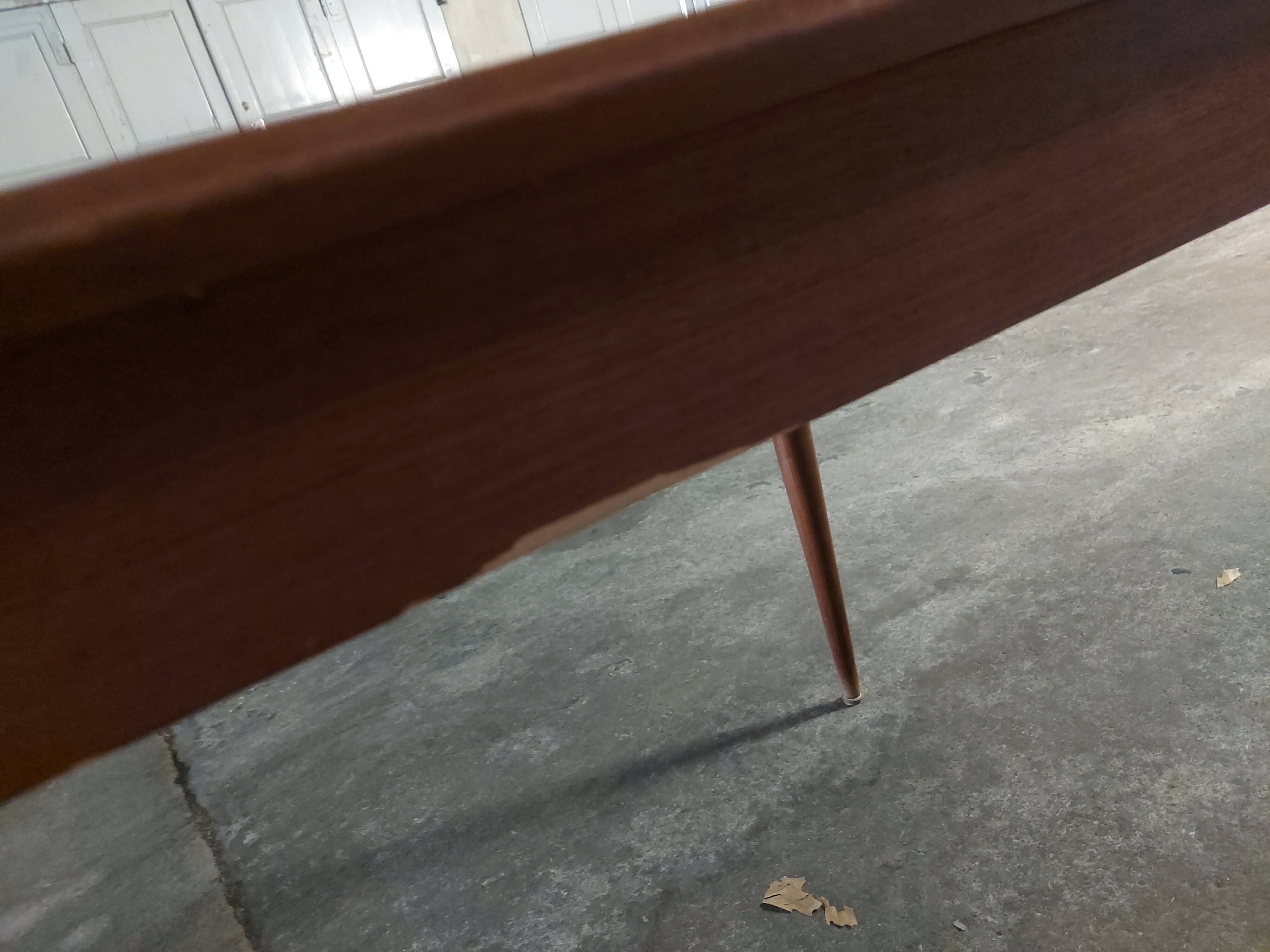 Scandinavian teak table with built-in extension