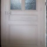 Large glazed door and its old glazed transom.