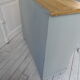 Vintage shoe cabinet green of gray, wooden top.