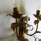 Pair of golden wall sconces and porcelain flowers
