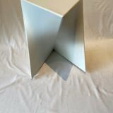 Pair of unmarked triangular white design stools