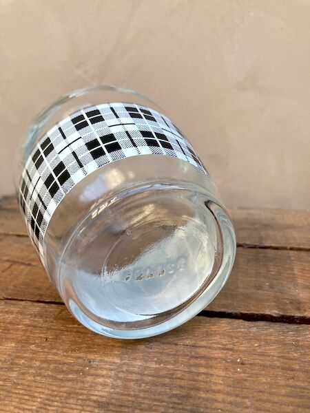 Vintage decanter with black and white tiles