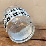 Vintage decanter with black and white tiles