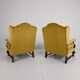Paire de fauteuils en noyer sculpté du XIXe siècle – motifs floraux – revêtement en velours