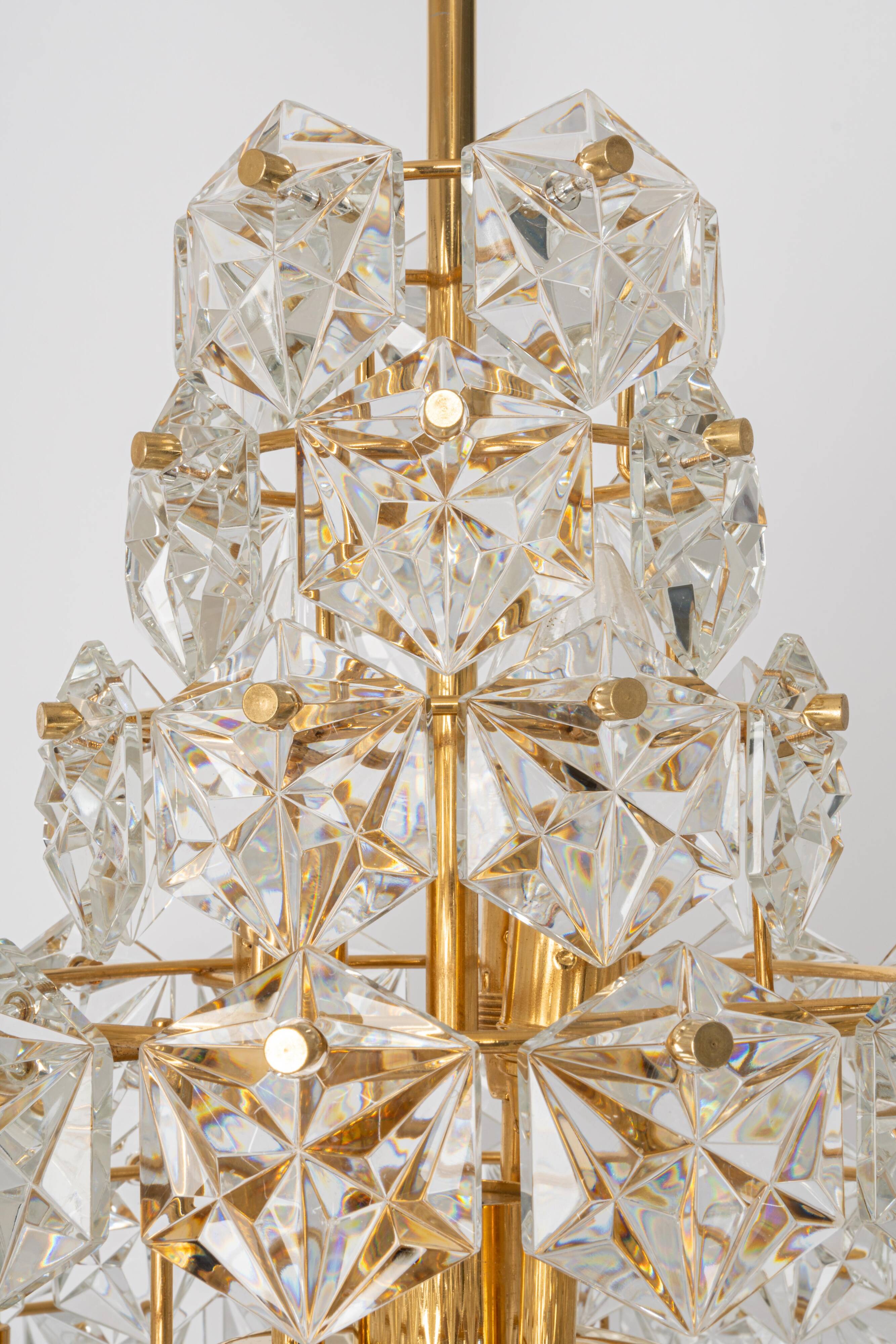 Chandelier, brass and crystal glass by Kinkeldey, Germany, 1970s.