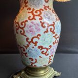 Old Asian vase mounted as a lamp with pagoda lampshade