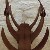 Unique piece of a magazine rack or log rack in solid oak pegged with leather handle