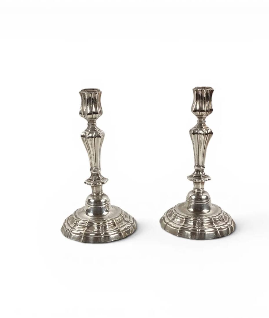 Pair of silvered metal candlesticks in the Louis XIV style.