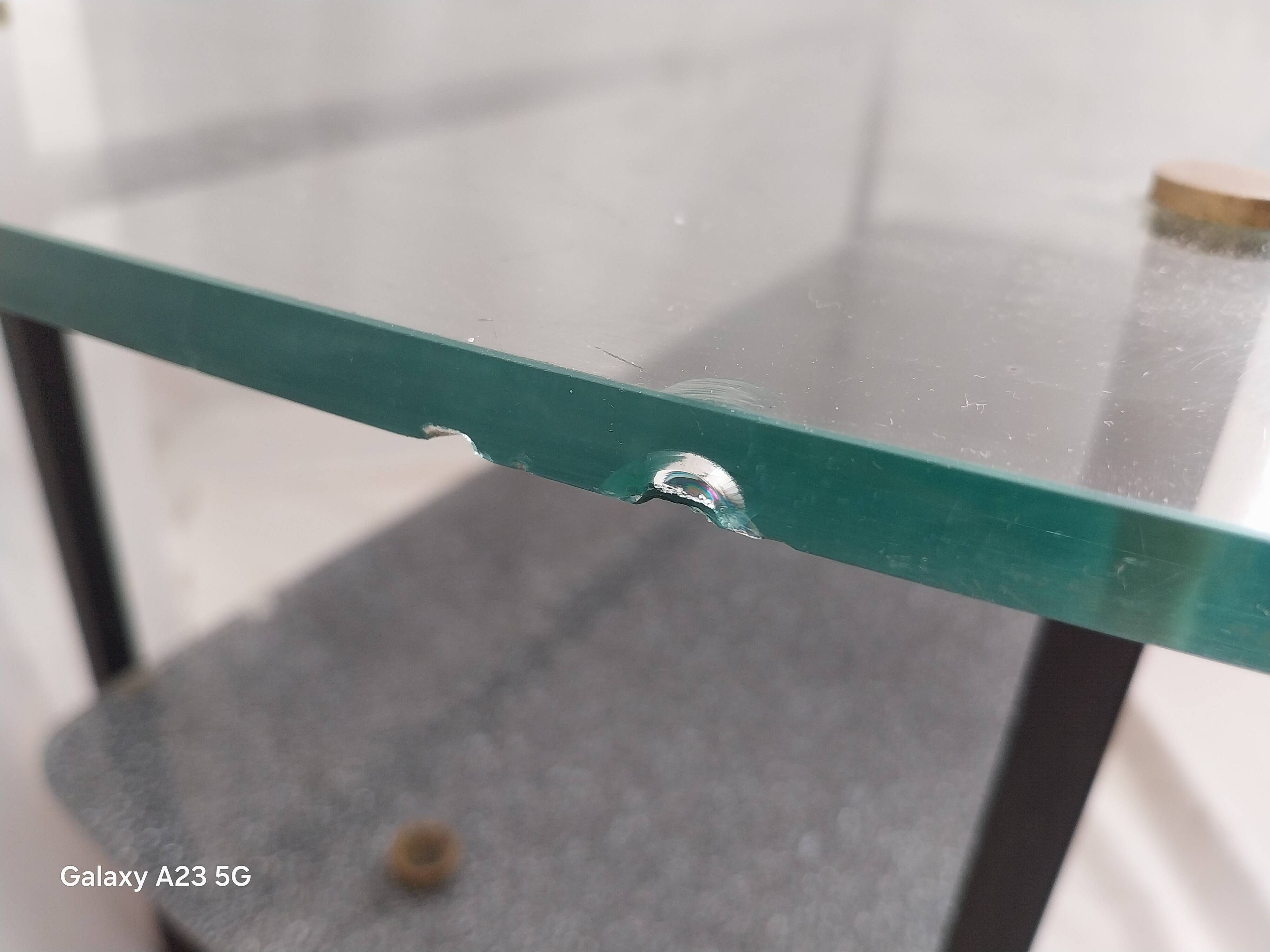Modernist coffee table with double glass top and black metal - 1950s.