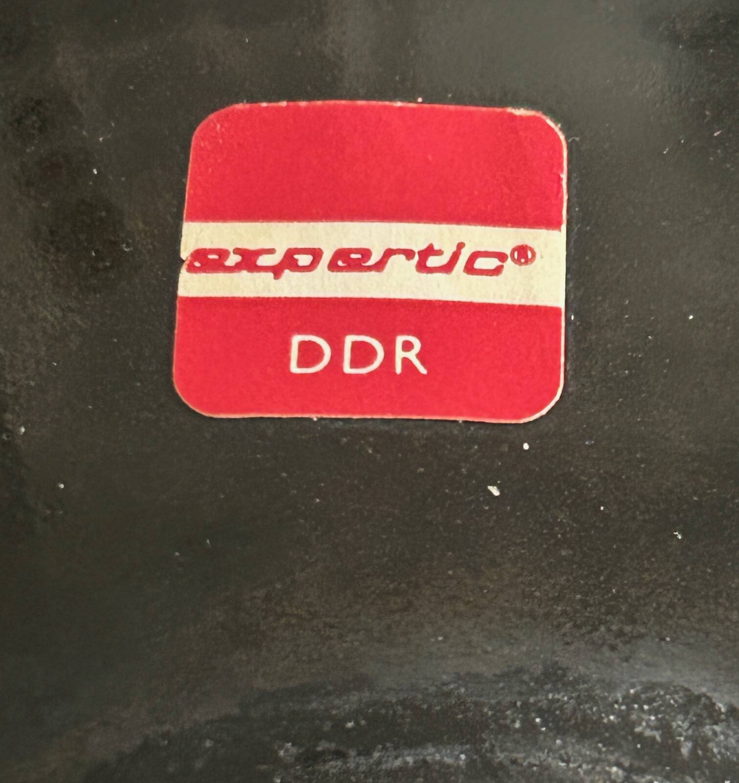 Expertic enamelled brass pocket emptier