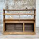 Wooden hardware cabinet painted with wood effect, circa 1940.