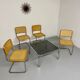 Space coffee table from the 70s, tubular metal and vintage smoked glass