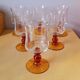 Service de 18 verres à pieds ambrés 70s