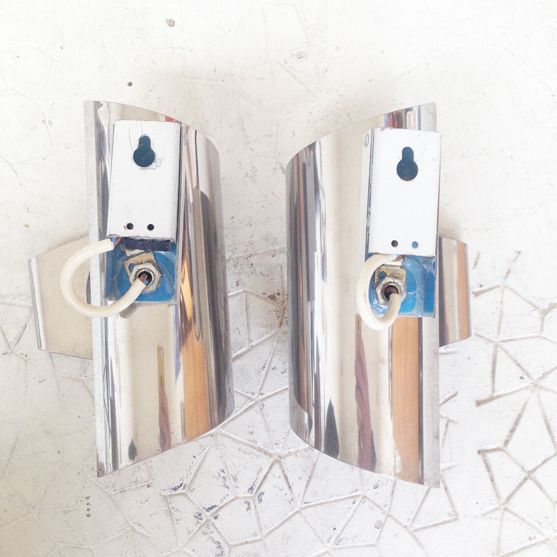 2 metal wall lights from the Maison Sciolari, Italy 1970