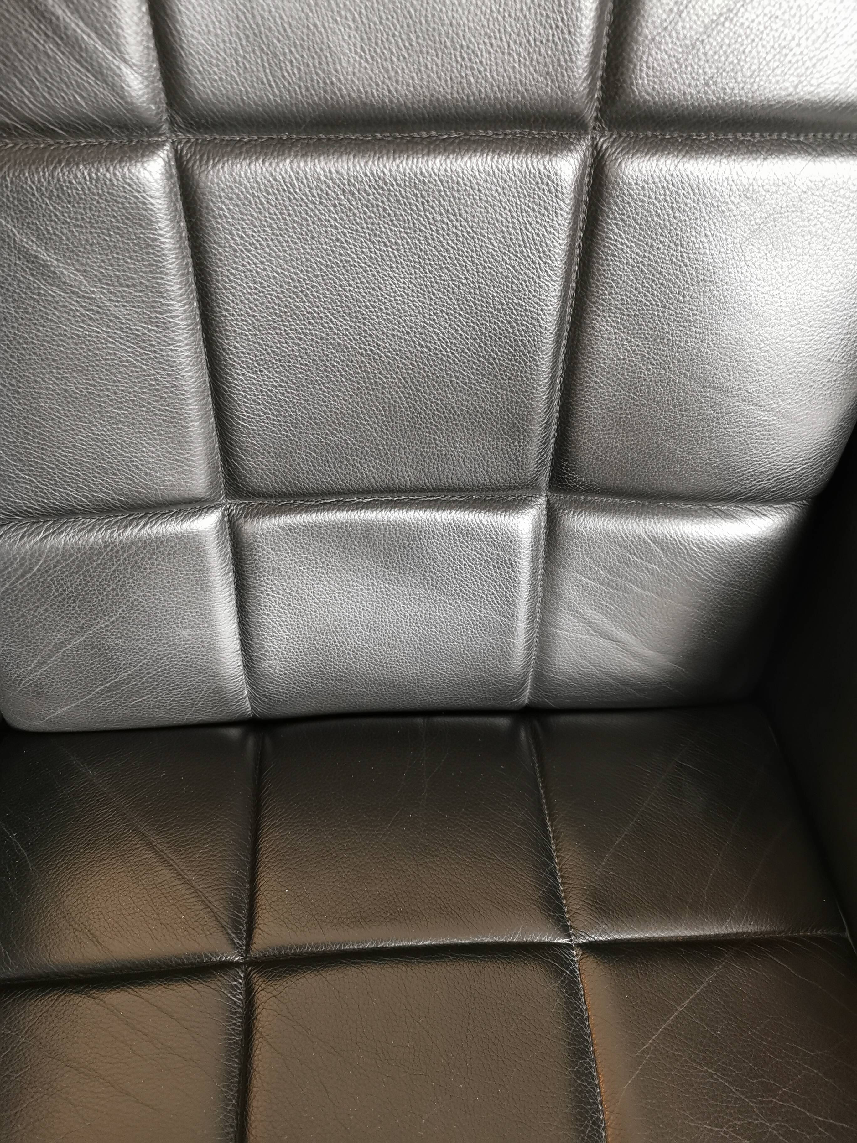 Vintage 1970s black leather armchair