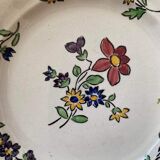 7 hand-painted flowered dinner plates.