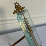 Frame in brass and beveled glass