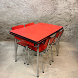 4 red Formica chairs with a 1970s table