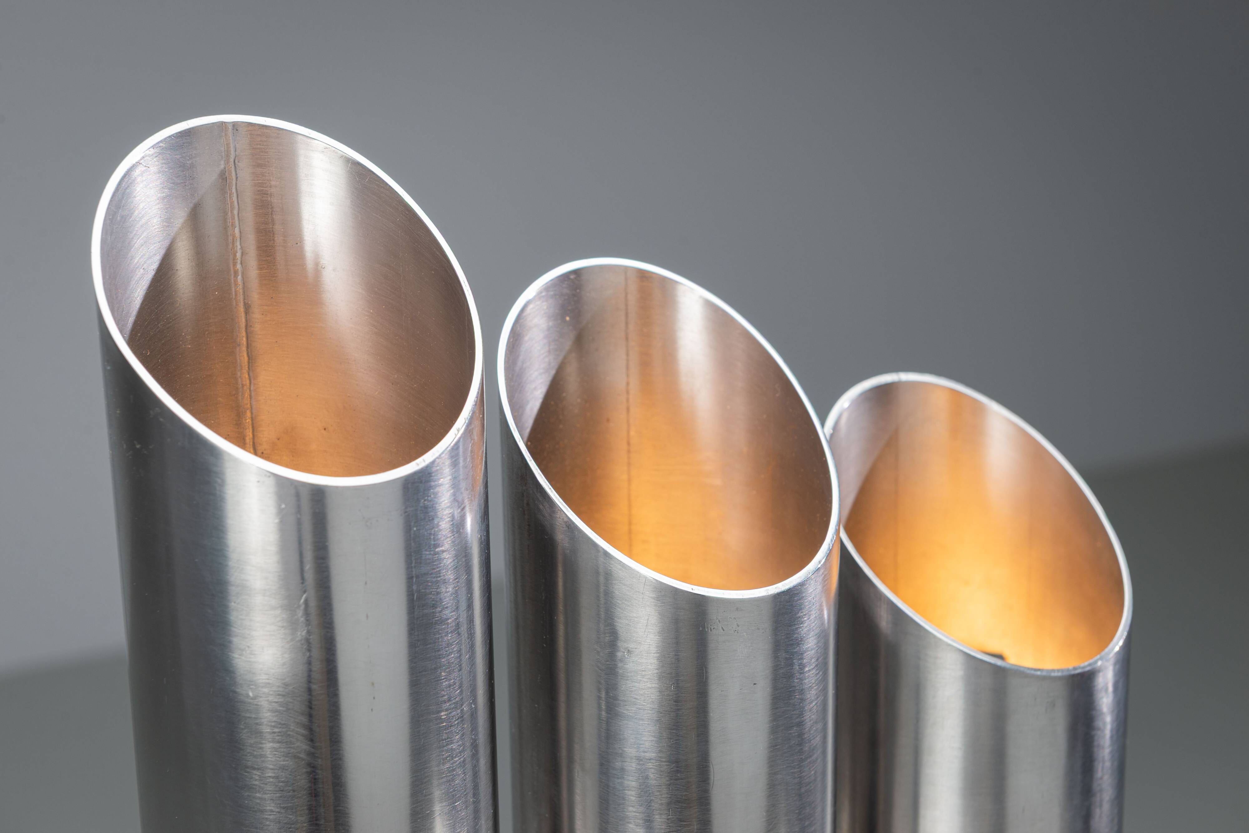 Triple column table lamp in stainless steel by Goffredo Reggiani