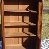 Glass library with rosewood marquetry in the Louis XV style.