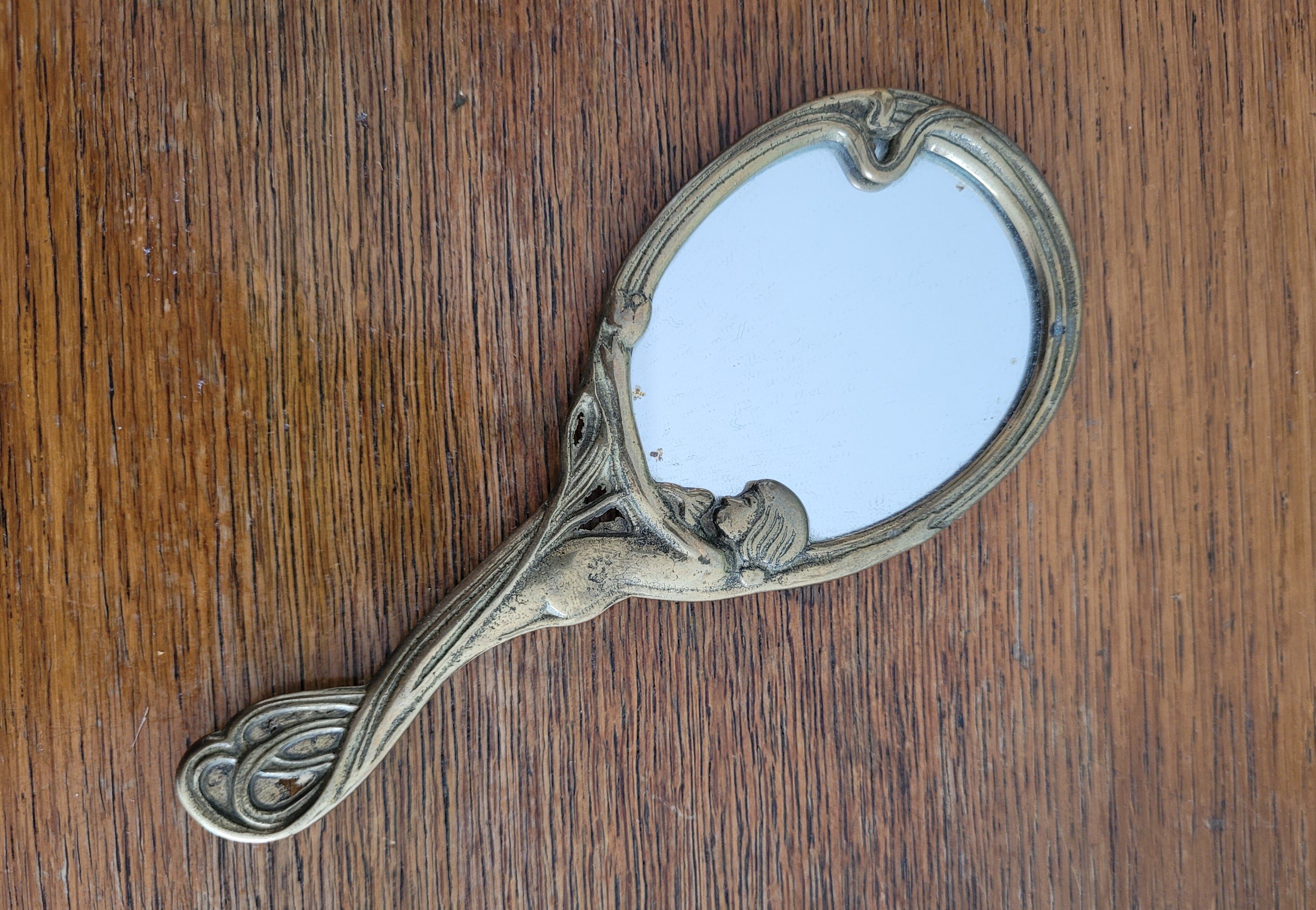 Art Nouveau brass hand mirror