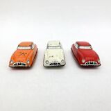 3 old small tin circuit cars with lead wheels • Vintage • 1960s