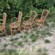 Set of 4 vintage Louis Sognot bamboo and rattan armchairs
