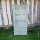 Parisian style display cabinet with 2 doors and 3 shelves in Luxembourg green.