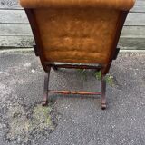 Chesterfield leather slipper chair with mahogany