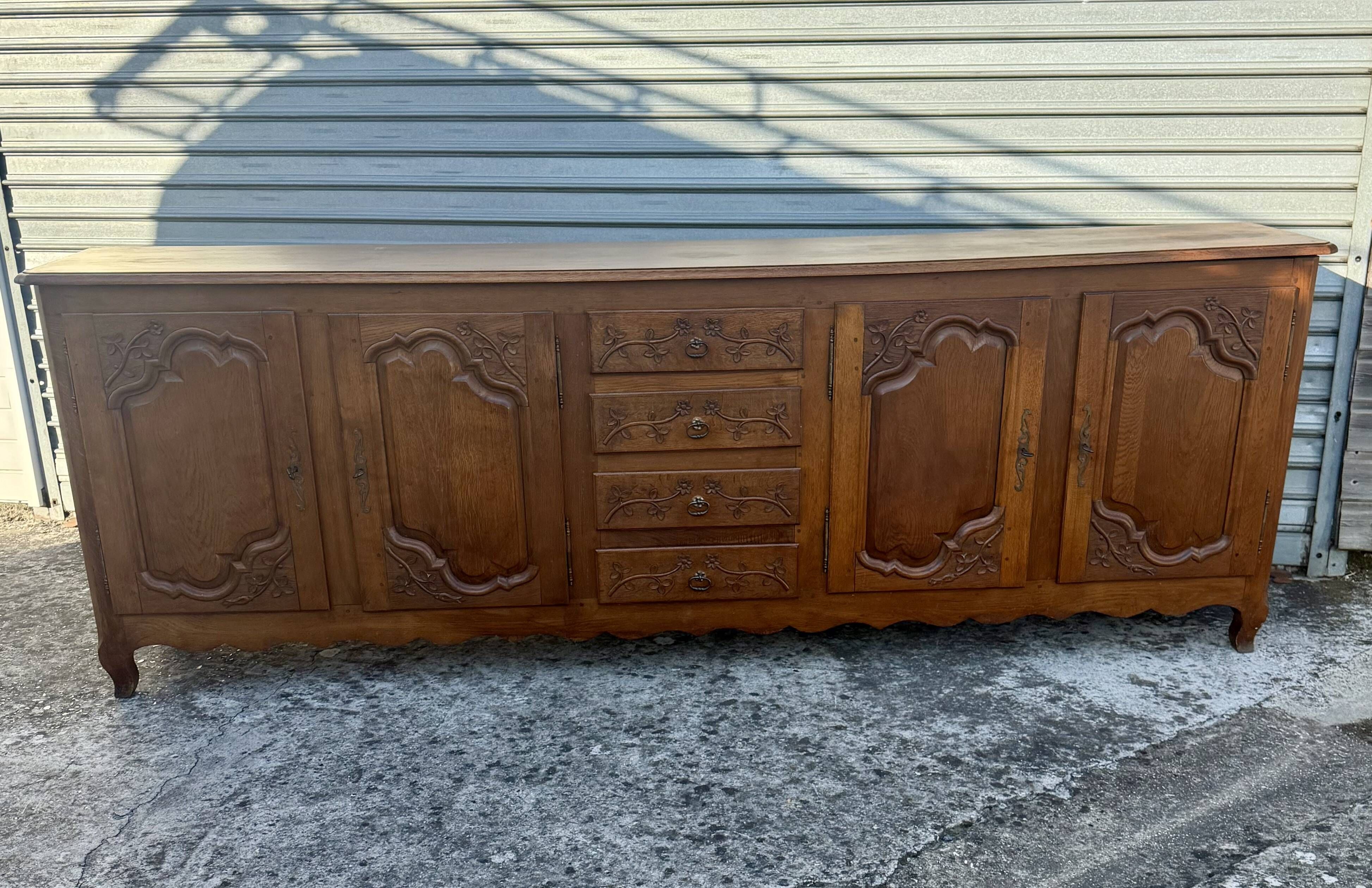Picard enfilade in Louis XV style made of solid oak.