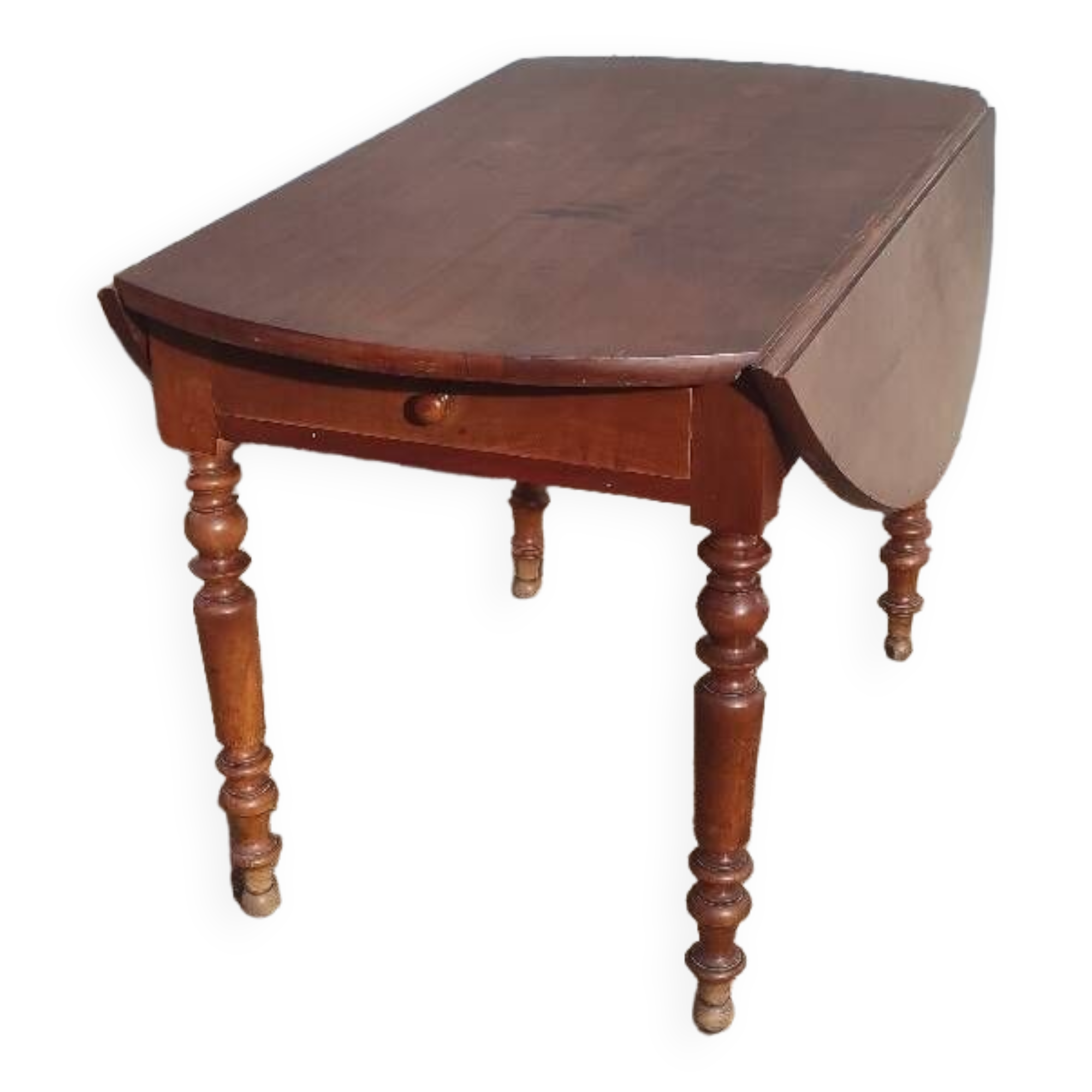 Old extendable round table in fruit wood with folding sides