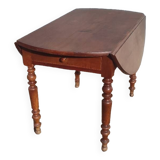 Old extendable round table in fruit wood with folding sides